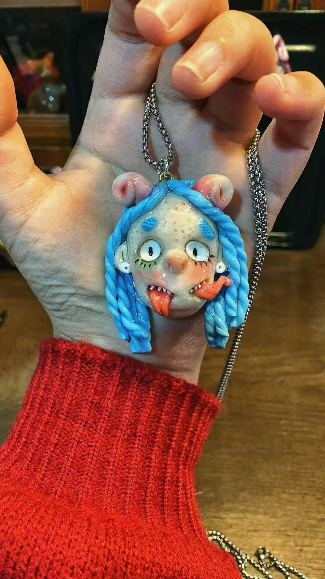 Kebarro Blue Eyes Nail With Two Tongue Weird Clay Necklace