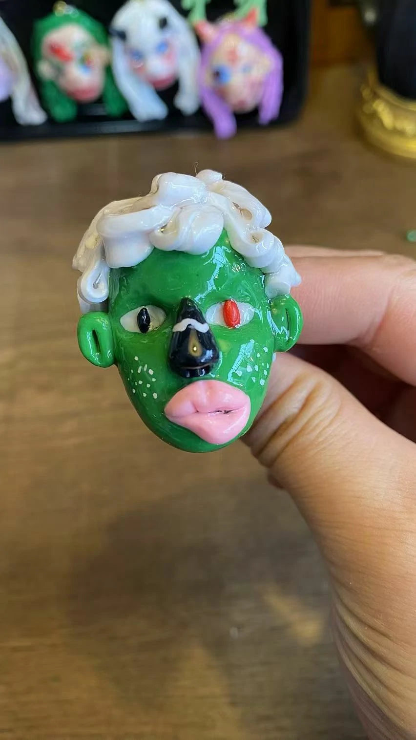 Kebarro Green Face White Hair Clay Necklace