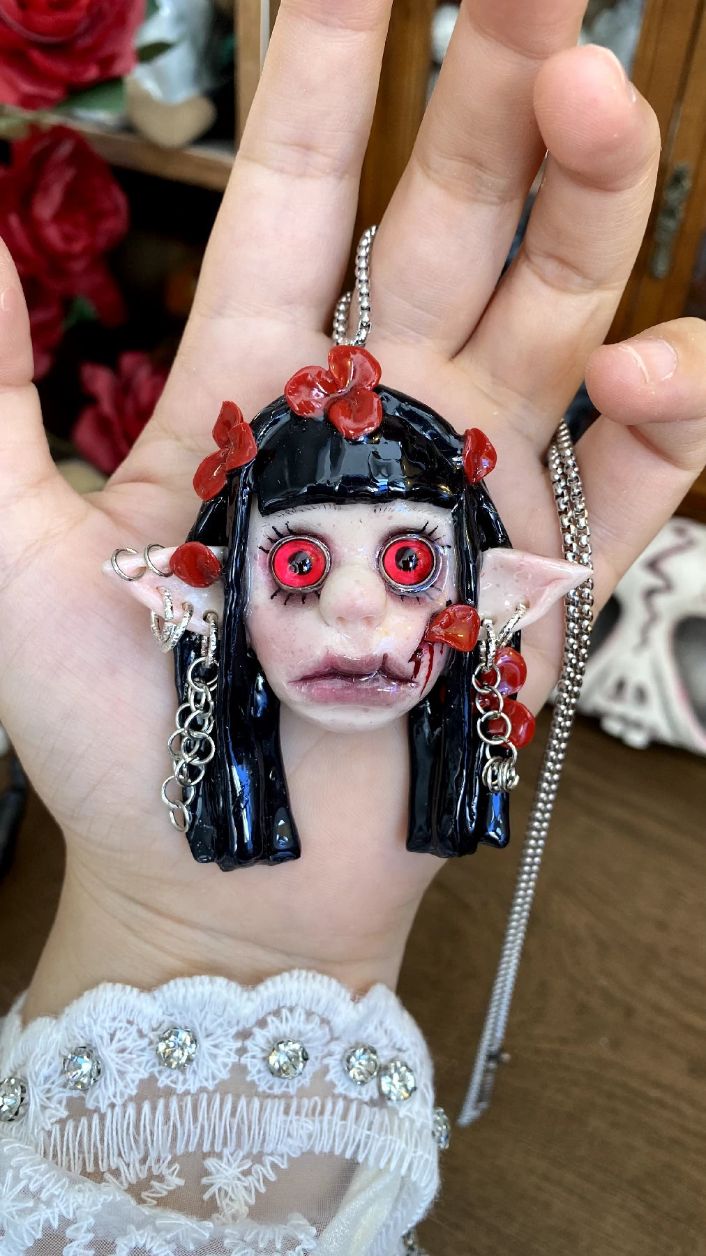 Kebarro Red Eyes Flower Adorned Elf Doll Clay Necklace
