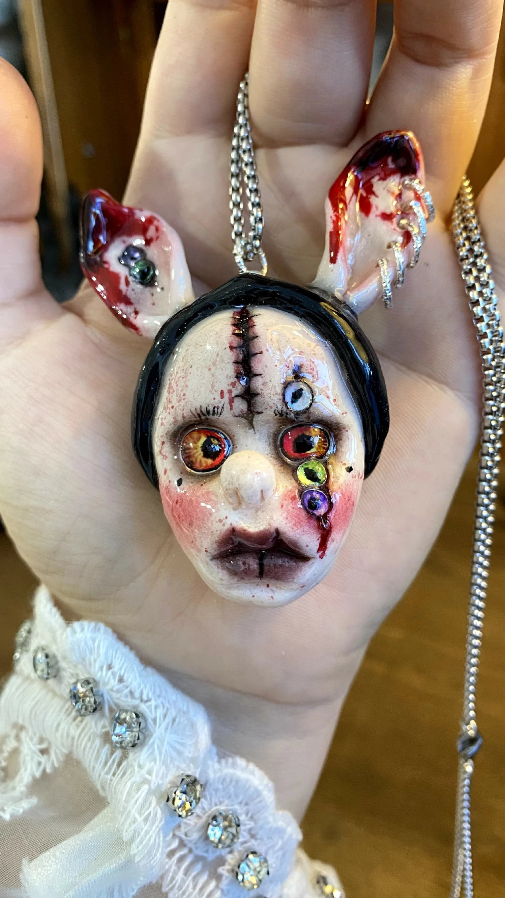 Kebarro Stiched Ears Multicolor Eyes Face Clay Necklace