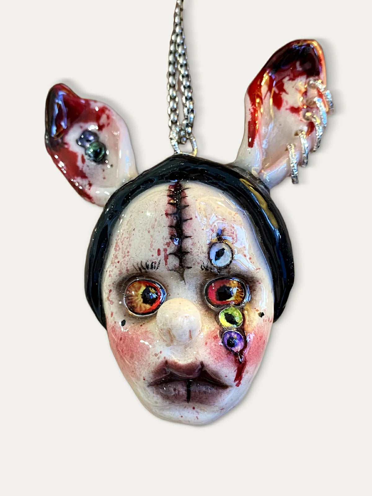 Kebarro Stiched Ears Multicolor Eyes Face Clay Necklace